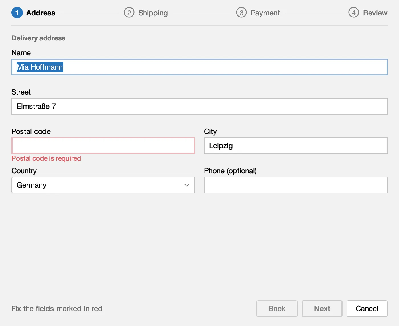 Checkout address step with the postal code marked in red